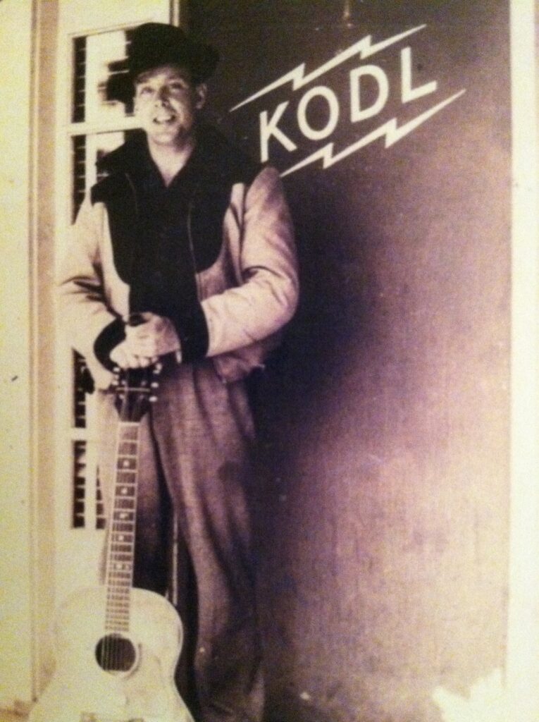 Johnny Mullins in front of KODL radio station in The Dalles Oregon